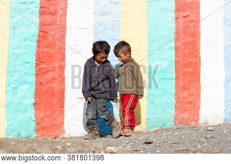 Jhong, Nepal - November 17, 2015: Little Nepali Boys Playing On The Village Street.