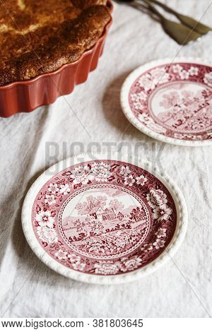 Apple And Cheese Cobbler Crisp. Cobbler Or Crumble Dessert With Apples In Ceramic Baking Form On Bei