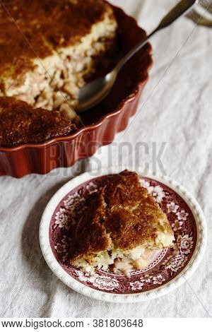 Apple And Cheese Cobbler Crisp. Cobbler Or Crumble Dessert With Apples In Ceramic Baking Form On Bei