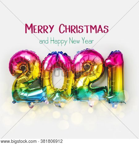 Rainbow Colored Foil Balloons In The Form Of Numbers 2021. New Year Celebration