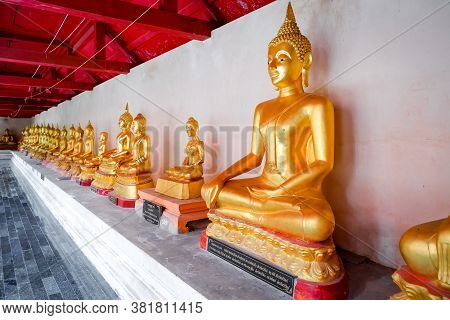 Phitsanulok, Thailand - July 04 2020 Row Of Gold Buddha Statue At At Phra Si Rattana Mahathat Temple