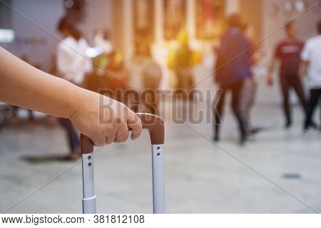Traveler Holding Suitcases At Airport Departure Lounge Travel In Airplane Terminal Background,travel