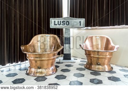 Luso, Portugal - December 14, 2019: Vintage, Golden And Shiny Thermal Bathtubs