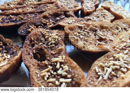 Overcooked Slice Of Homemade Bread In Close Up