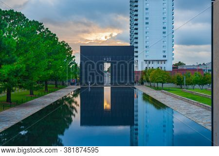 Oklahoma City Usa - September 9 2015; Oklahoma National Memorial Gate Of Time And Reflecting Pool Lo