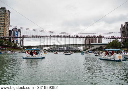 Unidentified People Enjoying Pedal Boats At Bitan Scenic Area
