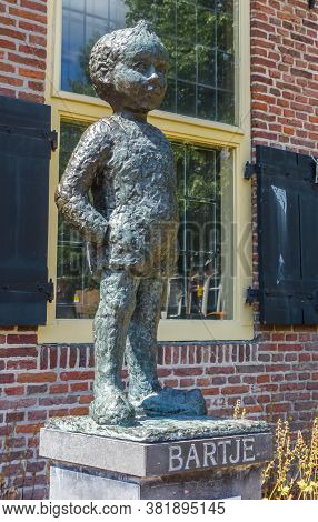 Assen, Netherlands - May 30, 2020: Statue Of Little Boy Bartje In Assen, Netherlands