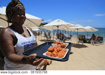 Salvador, Bahia / Brazil -  December 30, 2015: Andreia Pinheiro, Baiana De Acaraje, Prepares The Foo