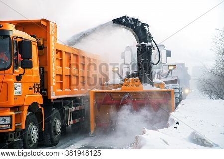 Norilsk, Russia - March 23, 2020: Closeup Of The Snow Impeller Of An Orange Snow Blower
