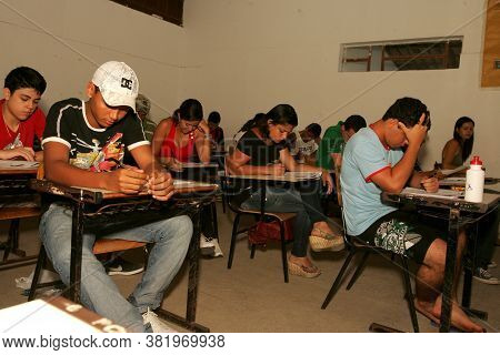 Eunapolis, Bahia / Brazil - November 6, 2010: People Are Seen Taking Exams At The National High Scho