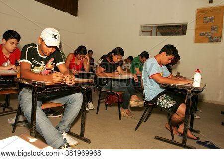 Eunapolis, Bahia / Brazil - November 6, 2010: People Are Seen Taking Exams At The National High Scho