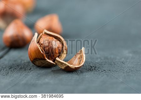 Hazelnuts, Filbert On Wooden Table. Heap Or Stack Of Hazel Nuts. Hazelnut Background, Healty Food