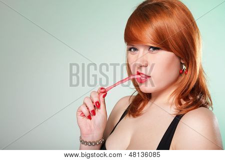 Happy Redhair Woman With Gummy Candy