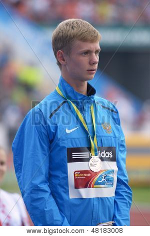DONETSK, UKRAINE - JULY 14: Silver medalist in 800 metres Konstantin Tolokonnikov of Russia on medal ceremony during 8th IAAF World Youth Championships in Donetsk, Ukraine on July 14, 2013