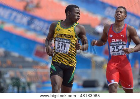 DONETSK, UKRAINE - JULY 14: Michael O'Hara of Jamaica (left) and Reynier Mena of Cuba compete in the final of 200 metres during 8th IAAF World Youth Championships in Donetsk, Ukraine on July 14, 2013