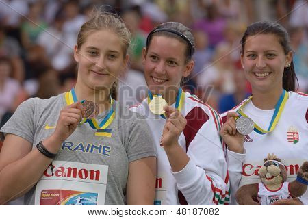DONETSK, UKRAINE - JULY 13: Medalists in the hammer throw on the medal ceremony during 8th IAAF World Youth Championships in Donetsk, Ukraine on July 13, 2013