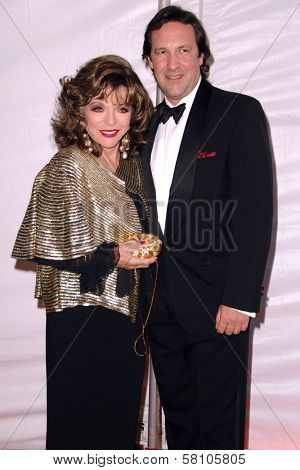 Joan Collins and Percy Gibson  at the 2007 World Magic Awards to benefit Feed The Children. Barker Hangar, Santa Monica, CA. 10-13-07