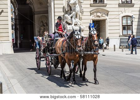 Traditional Coach (fiaker) Today Traveling Tourists In Vienna, Austria