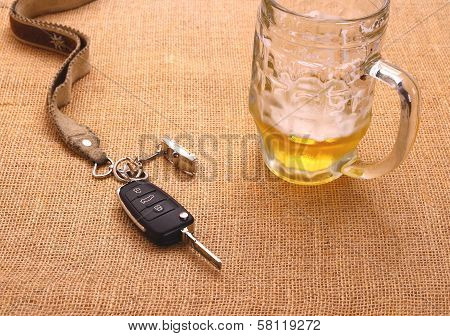 Car Key With Accident And Beer Mug