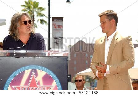 Paul Greengrass and Matt Damon at the award ceremony honoring Matt Damon with a star on the Hollywood Walk of Fame. Hollywood Blvd., Hollywood, CA. 07-25-07