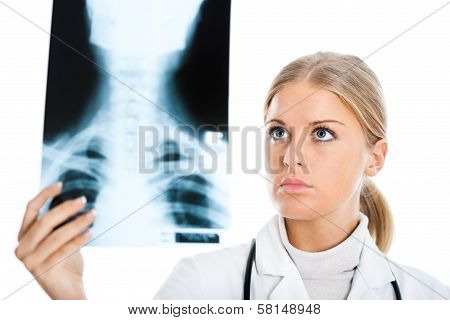 Doctor looking at x-ray image