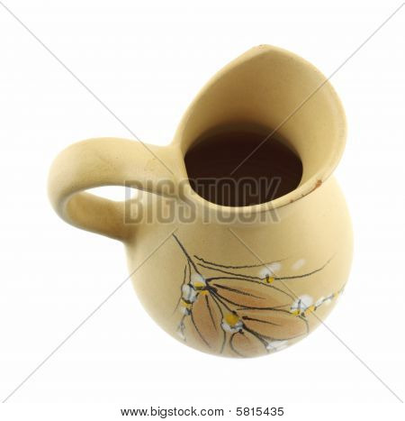 Vecchia brocca scheggiato con disegno floreale