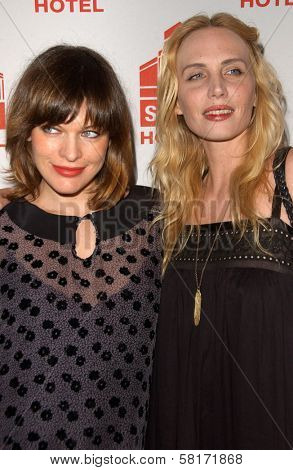 Milla Jovovich and Carmen Hawk  at the Los Angeles Debt of Jovovich-Hawk. Stoli Hotel, Hollywood, CA. 05-14-07