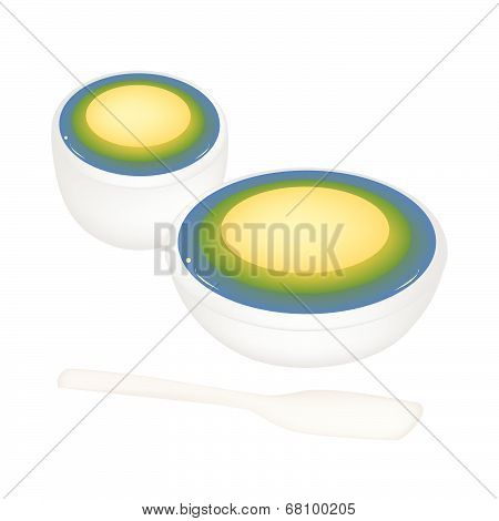 Thai Dessert Of Layer Coconut Pudding In Bowls.