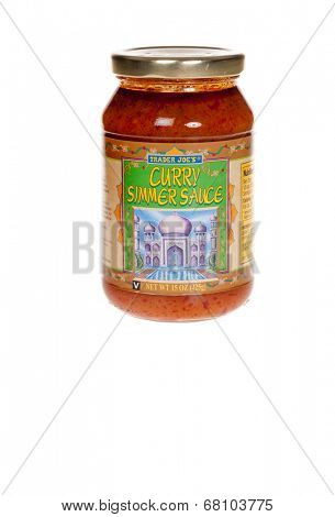 HAYWARD, CA - July 8, 2014: 12 oz jar of Curry Simmer Sauce, sold by Trader Joes', a privately held chain of specialty foods stores