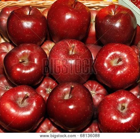 Group of red apples in row