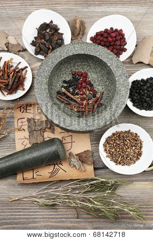 Traditional chinese herbal medicine ingredients with not real hieroglyphs, close-up