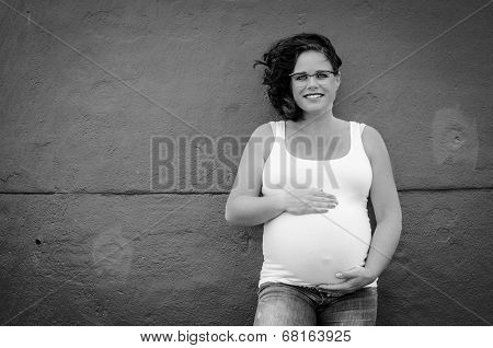 pregnant woman showing her belly