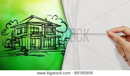 Hand Open Crumpled Paper To Show Skecth Of House Green Nature Background As Concept