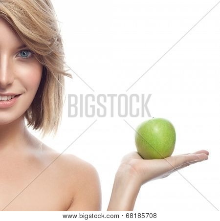 portrait of attractive  caucasian smiling woman blond isolated on white studio shot eating green apple