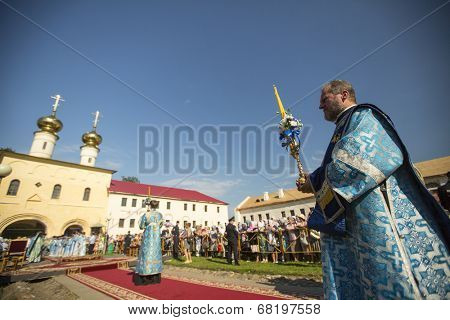 TIKHVIN, RUSSIA - JULY 9, 2014: Unidentified participants Orthodox divine Liturgy on the occasion celebrations of the 10th anniversary of the return of the Tikhvin icon of the Mother of God.