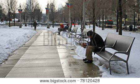 People Relax On The Chairs At Millenium Park