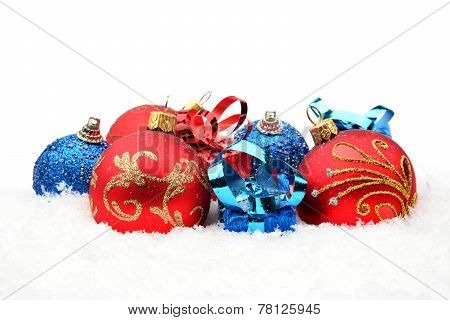 Red,blue Christmas Decoration On Snow In Line