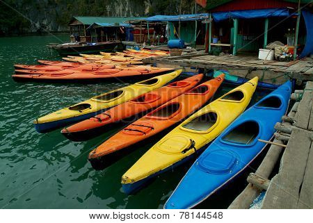 Row of Kayaks waiting tourists in Halong Bay,Vietnam.