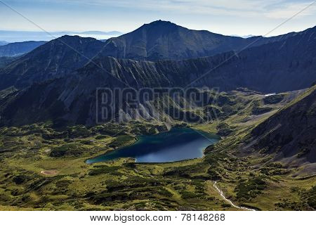 Mountain Lake Surrounded By Mountains