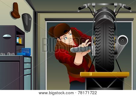 Man Fixing A Motorcycle