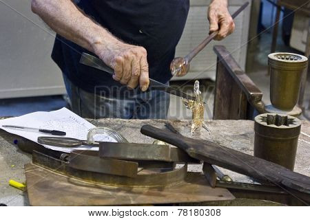 Artisan At Work Making Glass Sculpture