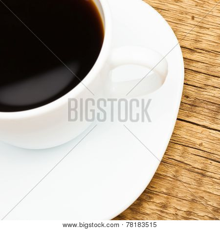 Close Up Of White Ceramic Coffee Cup On Wooden Table - Studio Shoot