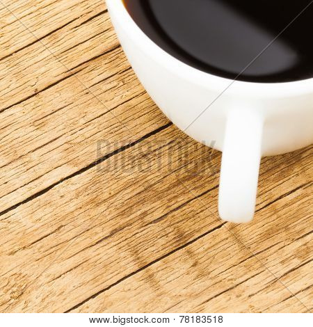 White Ceramic Coffee Cup On Old Wooden Table - View From Top