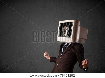 Business man with monitor screen on his head traped into a digital system concept