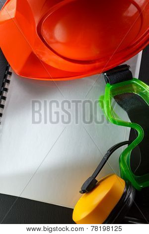 Goggles, Earphones And Red Helmet