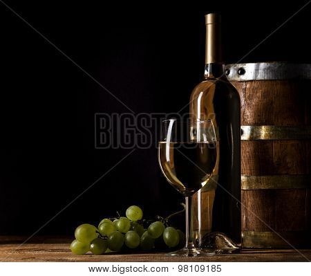 White wine on wooden background