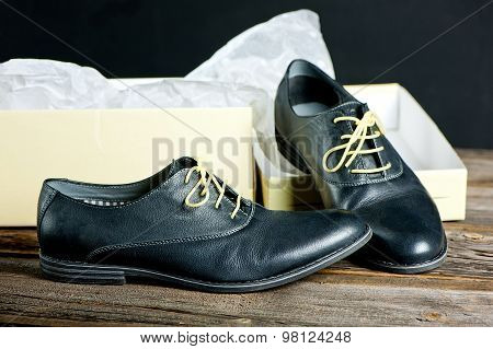 italian leather shoes concept: boots laced with spaghetti