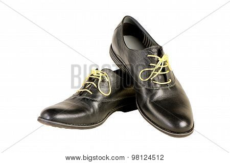 isolated italian leather shoes concept: boots laced with spaghetti
