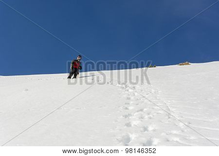Hiker In Winter In Mountain