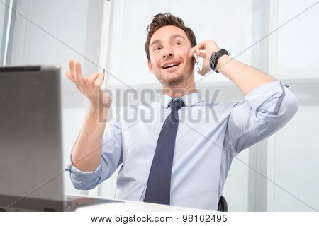 Call center operator talking on mobile phone
